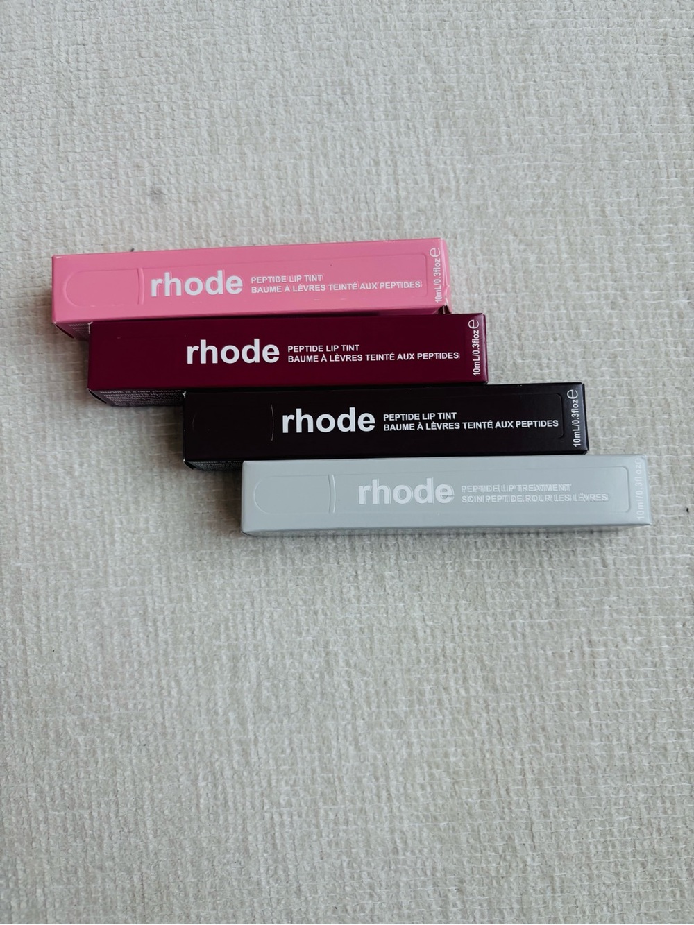 RHODE Peptide Lip Tint Set in Pink, Burgundy, Black, Gray